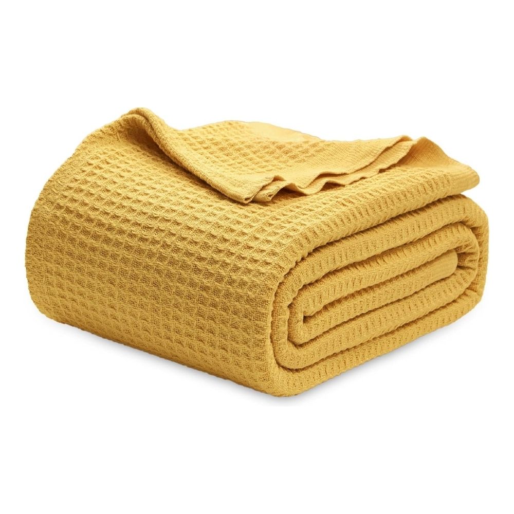  This elegant blanket features a classic waffle weave design with a distinctive three-dimensional texture that adds a touch of style to your bedroom.